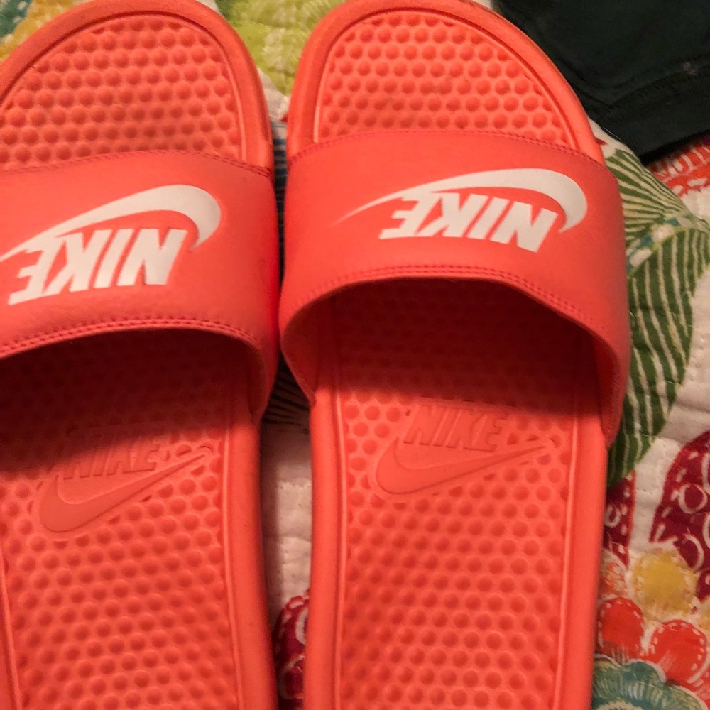Women’s size 9 CORAL Nike slides
